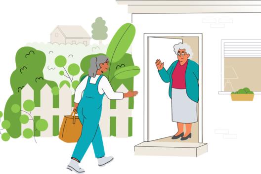 Eine Frau bringt einer Senioren eine Tüte mit Einkäufen
