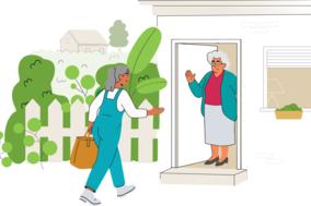 Eine Frau bringt einer Senioren eine Tüte mit Einkäufen